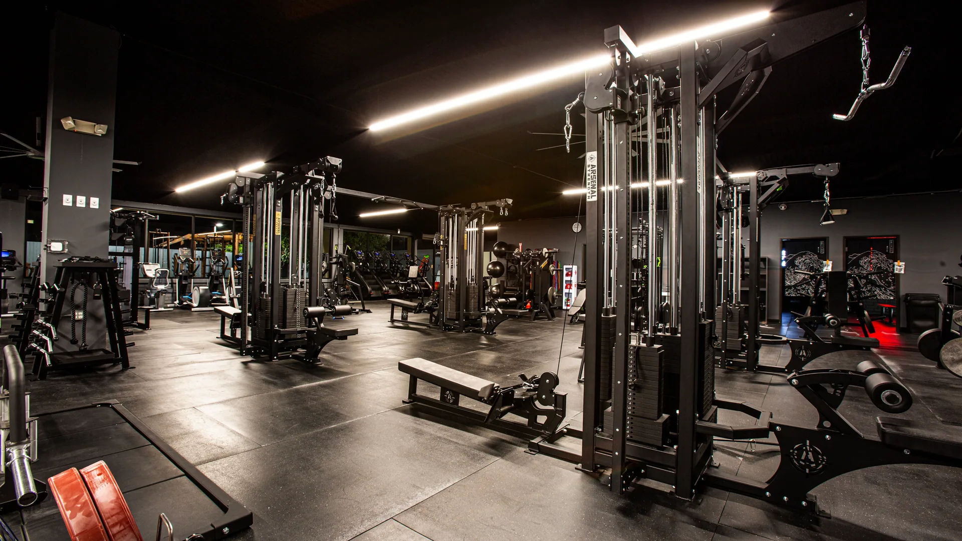 Cable machines and flat benches on the main floor