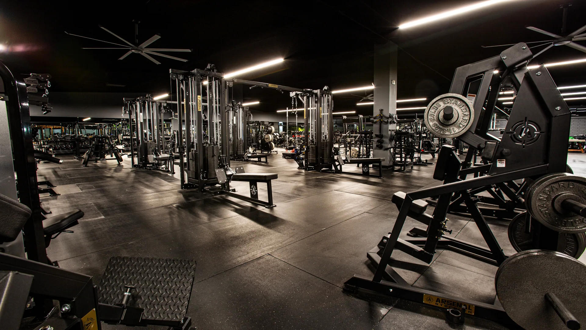Wide floor view, racks and machines under the ceiling fans